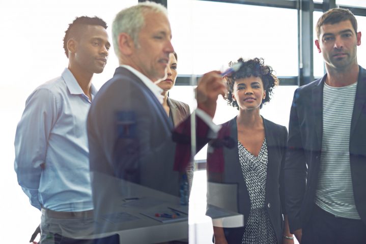 Shot of a group of colleagues having a brainstorming session at work.